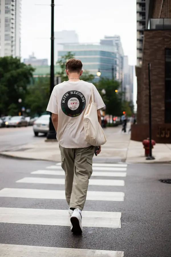 A senior crossing a downtown street
