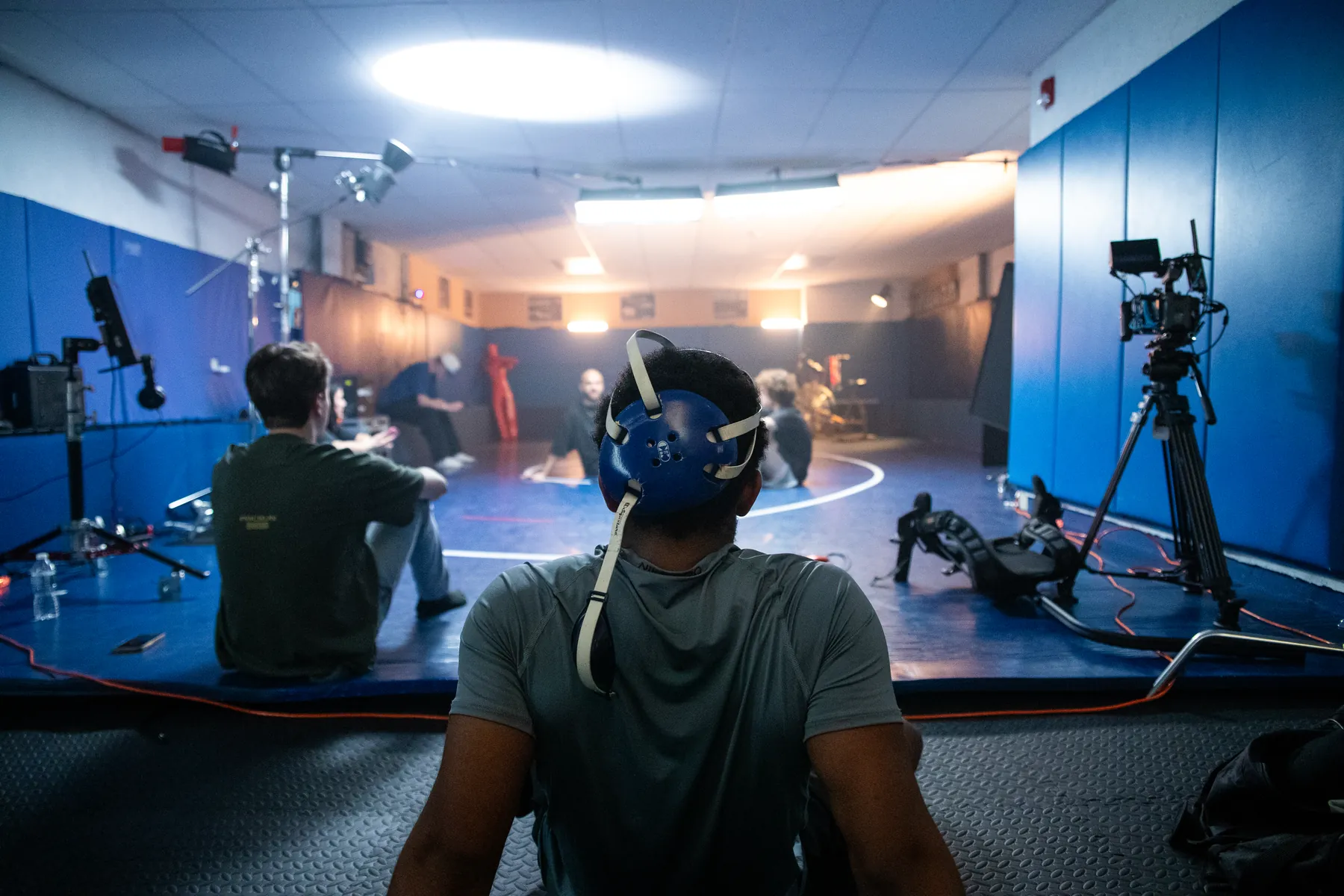 A lit wrestling studio set up for a shoot