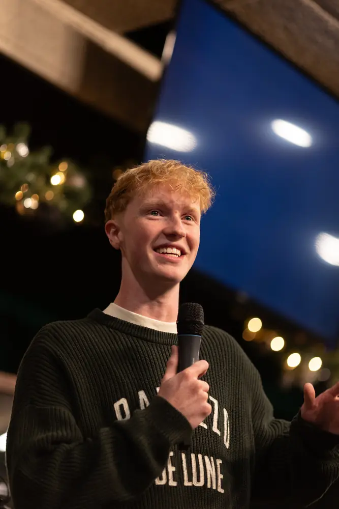 Jonah Reynolds, founder of Jreyfilms, speaking at an event